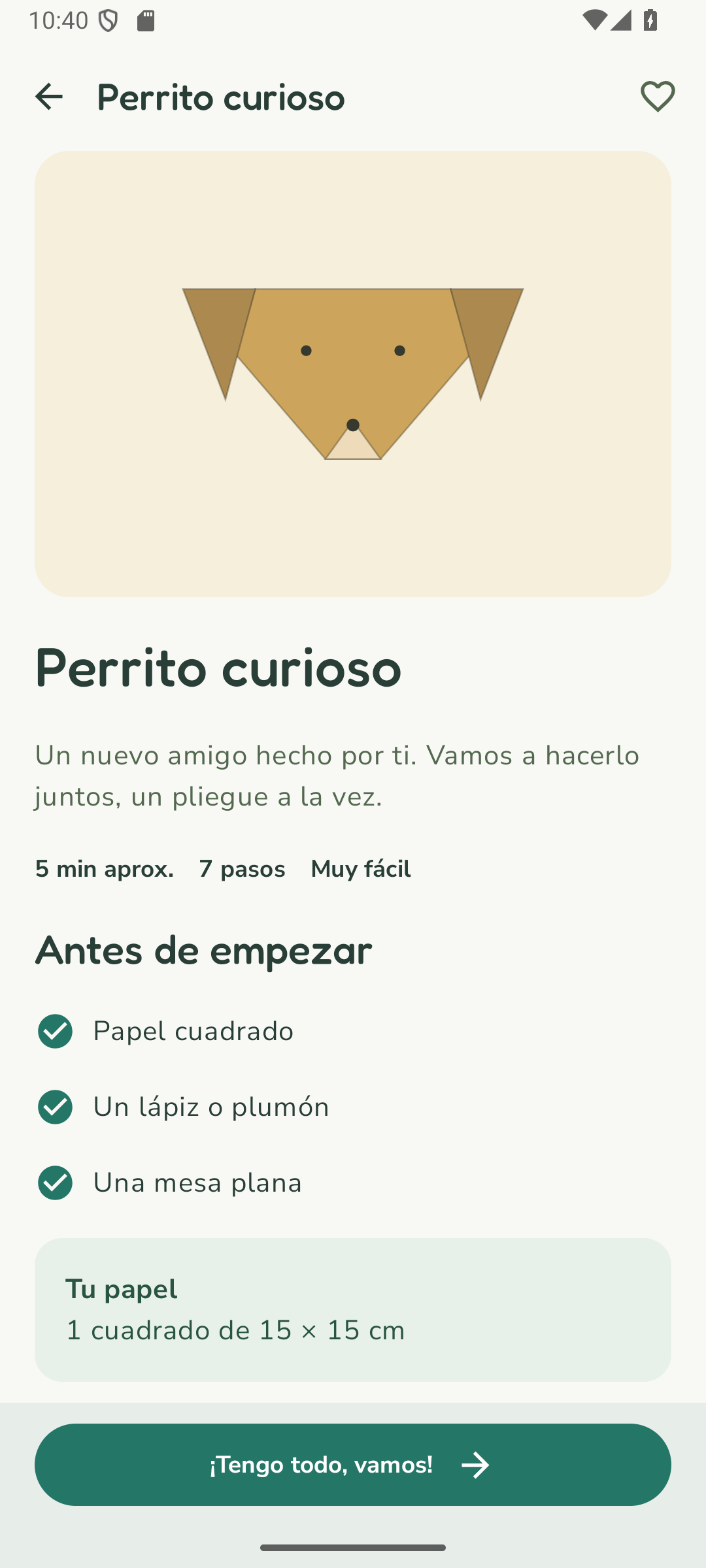 Origami muestra los materiales del perrito: papel cuadrado, un lápiz o plumón y una mesa plana